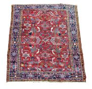 A Heriz carpet, approximately 315cm x 225cm