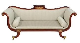 A Regency mahogany and brass inlaid sofa, circa 1815, the shaped back with central carved fan and