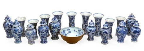 A collection of Chinese blue and white cargo wares, including nine beaker vases, ten jars and