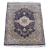 A Tabriz rug, approximately 188cm x 122cm