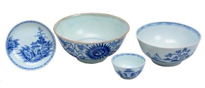 A group of Chinese blue and white wares including three bowls and a saucer from the Christie`s