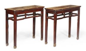 A pair of Chinese stained wood side tables, 19th century, 84cm high, 92cm wide, 33cm deep