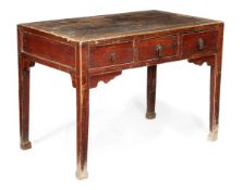 A Chinese red lacquered side table, 19th century, rectangular top, three frieze drawers, square