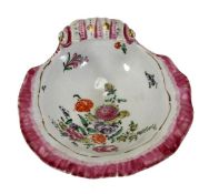 A Worcester polychrome shell-shaped dish, the well painted with floral sprays within a pink-band