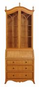 A satinwood and oak inlaid bureau bookcase, stamped Linley, last quarter 20th century, the bookcase