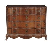A Dutch oak serpentine fronted chest of drawers, late 18th century, the moulded top above four long