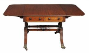 A George IV mahogany sofa table, circa 1825, with two short frieze drawers to each side above