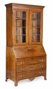 A mahogany bureau bookcase, late 19th/early 20th century, probably Continental, the moulded cornice