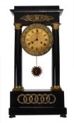 A French gilt brass mounted ebonised portico clock, Unsigned, mid 19th century, the eight-day