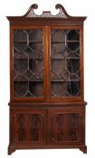 A mahogany cabinet bookcase in George III style, late 19th/early 20th century, in the manner of