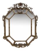 A Continental giltwood and composition octagonal wall mirror, second half 19th century, the central