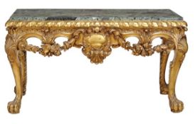 A carved giltwood console table in George II style, 20th century, serpentine marble top above a
