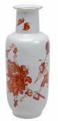 A Chinese underglaze iron red vase decorated with Wang Kui, the Demon queller, extinguishing ghosts