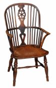 A fruitwood, elm and ash Windsor armchair late 18th/early 19th century with a hooped back, pierced