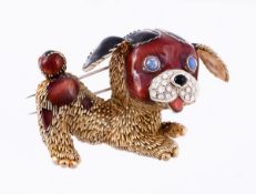 A gold, diamond, sapphire and enamel brooch by Frascarolo, designed as a playful puppy with brown
