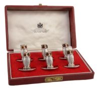 A matched set of six silver owl menu card holders, five by Asprey & Co. Ltd., London 1973 and one
