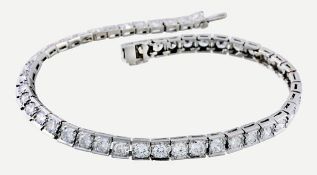 A diamond line bracelet, the articulated bracelet set along the line with brilliant cut diamonds,