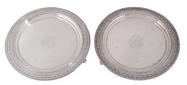 A pair of American silver coloured small salvers by Tiffany & Co., stamped marks, pattern no. 2007,