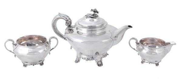 A matched silver compressed spherical three piece tea service, the William IV tea pot by Charles