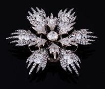 A late 18th century diamond flower head clip brooch, circa 1780, the central five pointed petals