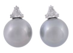 A pair of South Sea cultured pearl and diamond ear clips, the triangular cut diamonds above grey