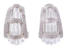 A pair of rock crystal and diamond ear clips, the carved rock crystal interspaced with brilliant