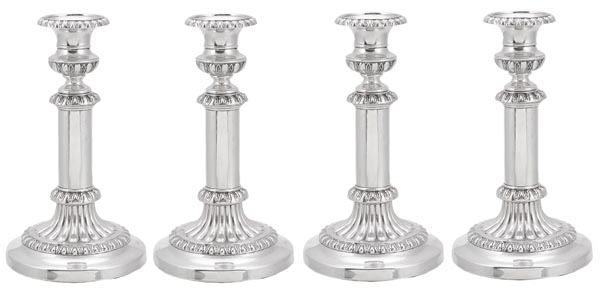 A set of four late George III telescopic candlesticks by John & Thomas Settle, Sheffield 1815, with