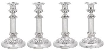 A set of four late George III telescopic candlesticks by John & Thomas Settle, Sheffield 1815, with