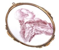A Battersea enamel oval portrait plaque, circa 1750-51, transfer printed in pinkish purple with a