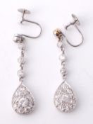 A pair of diamond ear pendents, the pear shape drops pave set with old, brilliant and rose cut