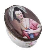 A Bilston enamel oval patch box, circa 1770, the cover painted with a dark haired beauty in an