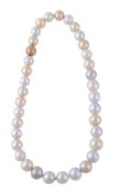 A South Sea cultured pearl necklace, comprising thirty-five graduated white, silver and light