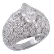 A diamond ring, the dome shaped band set with a central marquise shaped diamond, weighing 1.45