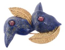 A French Lapis lazuli bird clip brooch by Yui, designed as a pair of birds, the two lapis lazuli