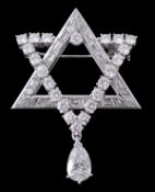 A diamond set Star of David brooch/ pendant, the entwined triangular sections claw set with