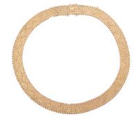 An 18 carat yellow gold collar necklace, compsed of highly felxible interwoven textured mesh links