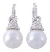 A pair of white South Sea cultured pearl and diamond earrings, the 13.4mm white South Sea cultured