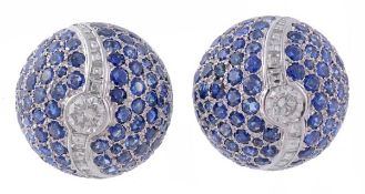 A pair of sapphire and diamond bombe ear clips, the circular dome set with a central brilliant cut