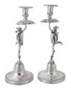 A pair of Italian silver figural candlesticks, maker`s marks poorly struck, Naples (Kingdom of the