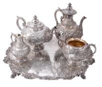 A Victorian silver four piece tea and coffee service and salver by Robert Harper, London 1866, the