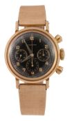 Movado, a gentleman`s 14 carat gold chronograph wristwatch, circa 1950, ref. 49013, no. 100T51, the