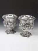 A pair of late George III silver wine coolers and collars by John & Thomas Settle, Sheffield 1817,