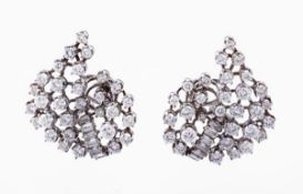 A pair of 1960s diamond ear clips, the openwork design set with a cluster of brilliant cut