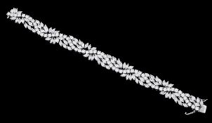 A diamond bracelet, the articulated bracelet set with brilliant and marquise cut diamonds,