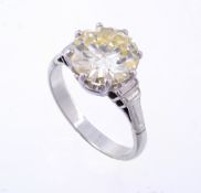 A diamond single stone ring, the brilliant cut diamond, weighing 3.10 carats, in a claw setting, to