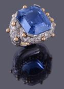 A sapphire and diamond dress ring by Jean Schlumberger, the central cut cornered step cut sapphire