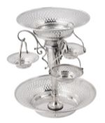 A silver epergne by The Goldsmiths & Silversmiths Co. Ltd., London 1910, with a central circular