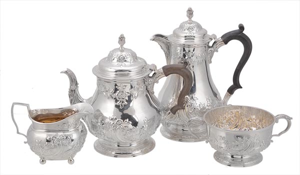 A matched silver baluster four piece tea service, by Lambert & Co. (Herbert Charles Lambert),