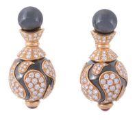 A pair of diamond, hematite and ruby ear pendents by Chopard, the oval domed hematite drop overlaid