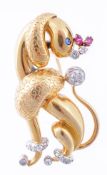 An abstract poodle brooch by Ba Lanche, the seated poodle, with diamond accented tail feet and